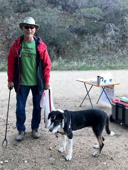 Dr. John Greenwod and his dog hiked the trail and picked up trash.